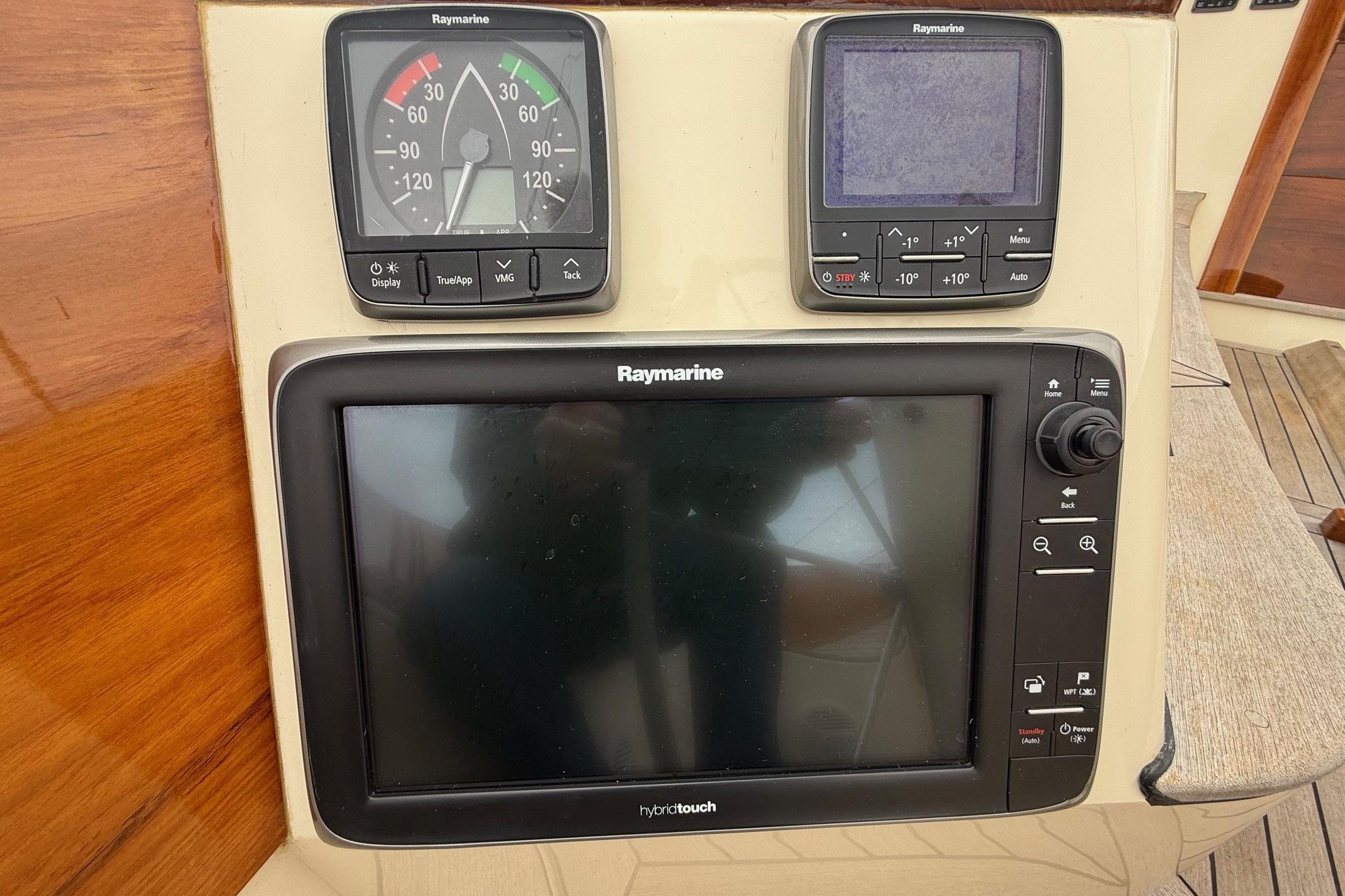 Hinckley DS 42 2015 yacht navigation panel with Raymarine instruments.