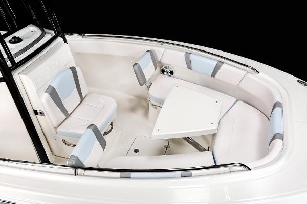 Manufacturer Provided Image: 2020 Robalo R230 Center Console boat seating area with table and cushioned seats.