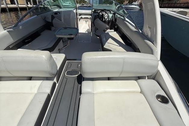 2014 Regal 2500 Bowrider boat interior with white seating and sleek design.