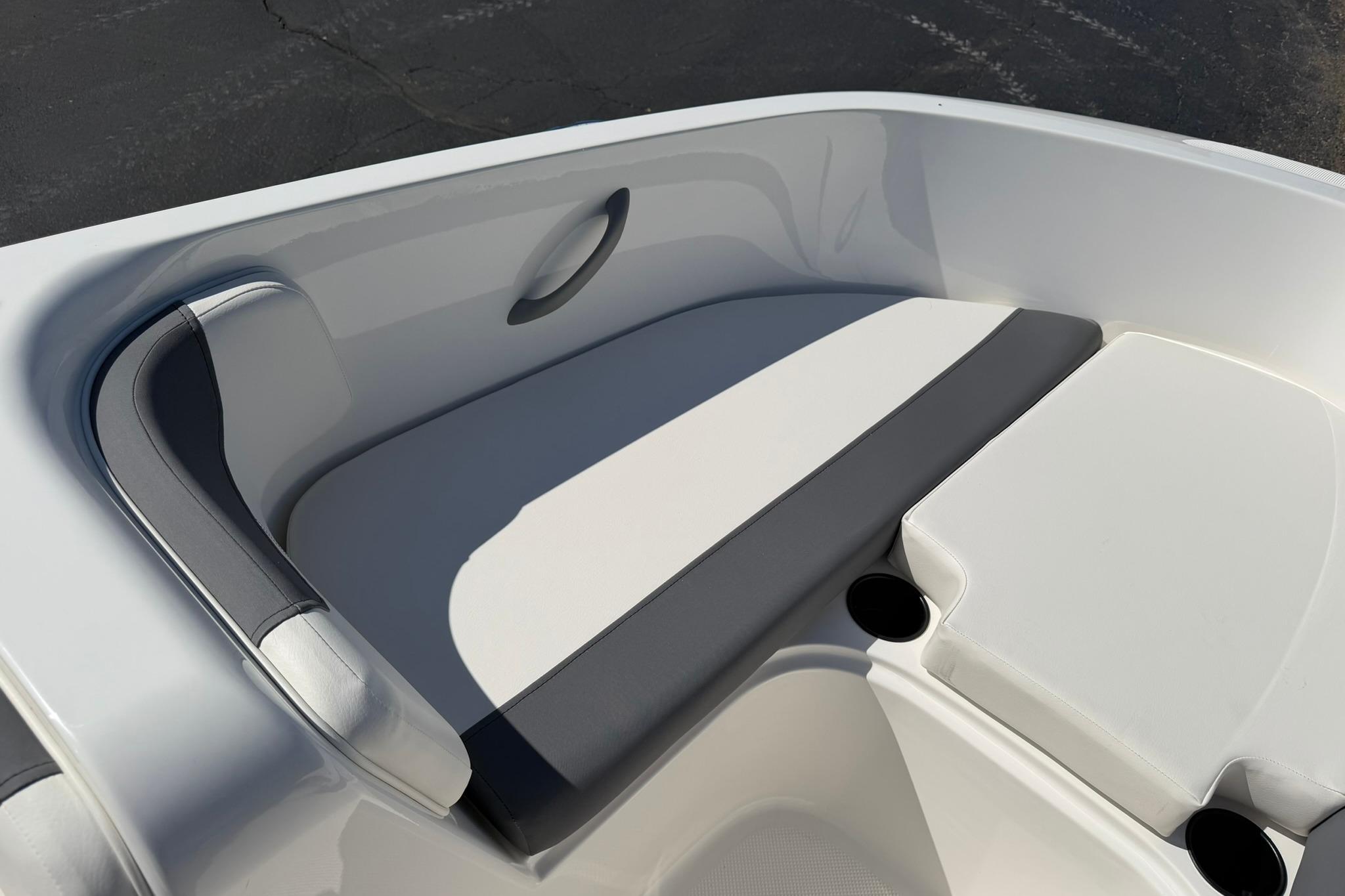 2026 Bayliner Element E18 boat interior seating with sleek white and gray design.