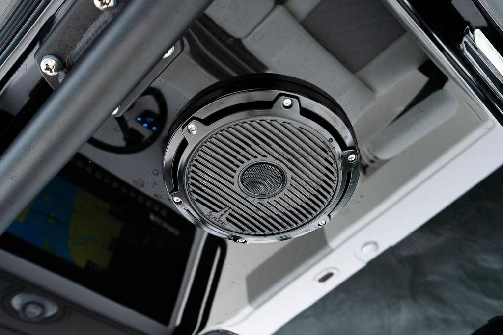 Close-up of a speaker on a 2027 Reef Runner 280 boat dashboard.