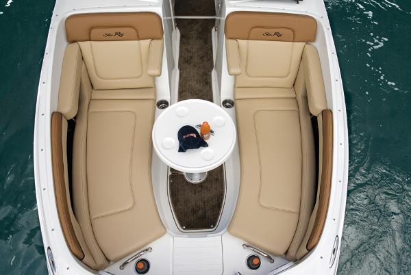 Manufacturer Provided Image: 2014 Sea Ray 260 Sundeck boat interior with tan seating and round table.