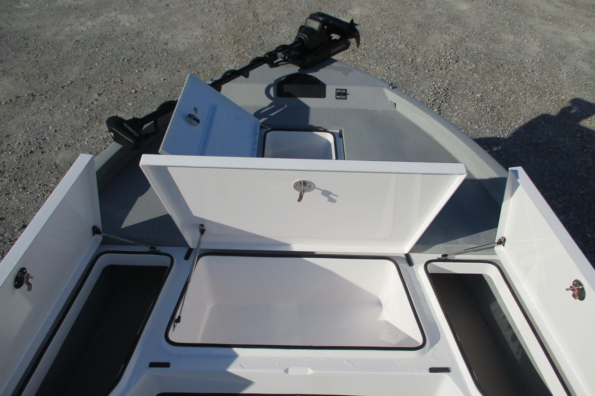 2026 Vexus ACX2210 boat storage compartments open, showcasing spacious interior design.