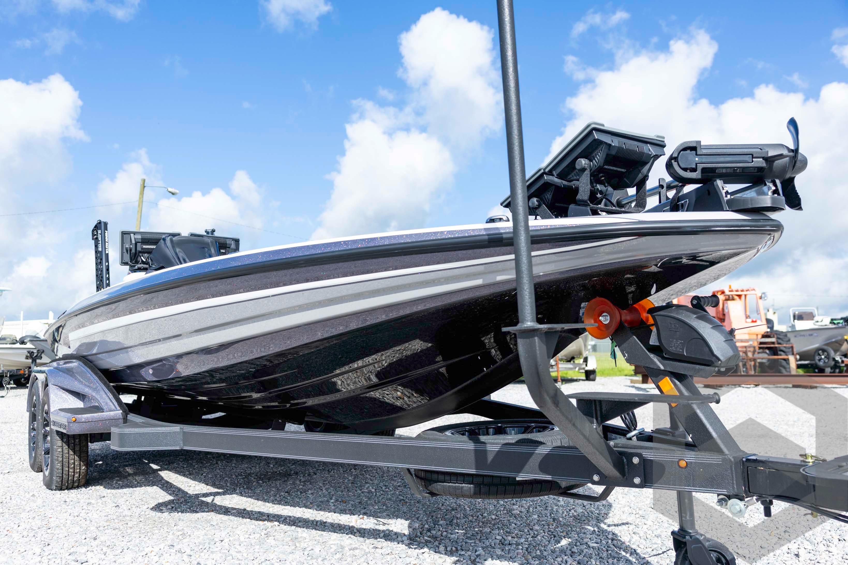 2026 Skeeter FXR20 FLEX boat on trailer under blue sky.