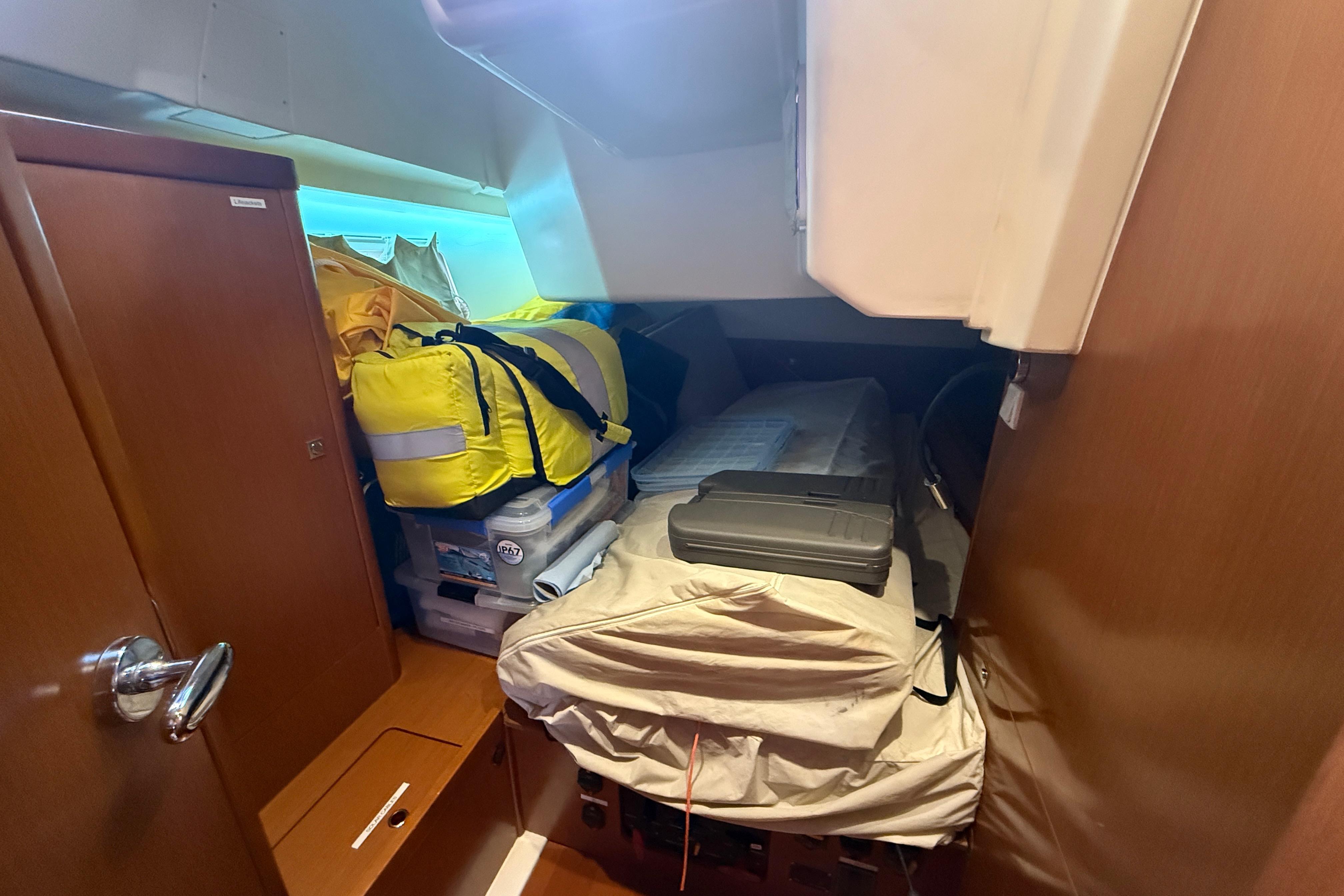 Interior cabin of 2013 Beneteau Oceanis 41 yacht with storage and equipment.