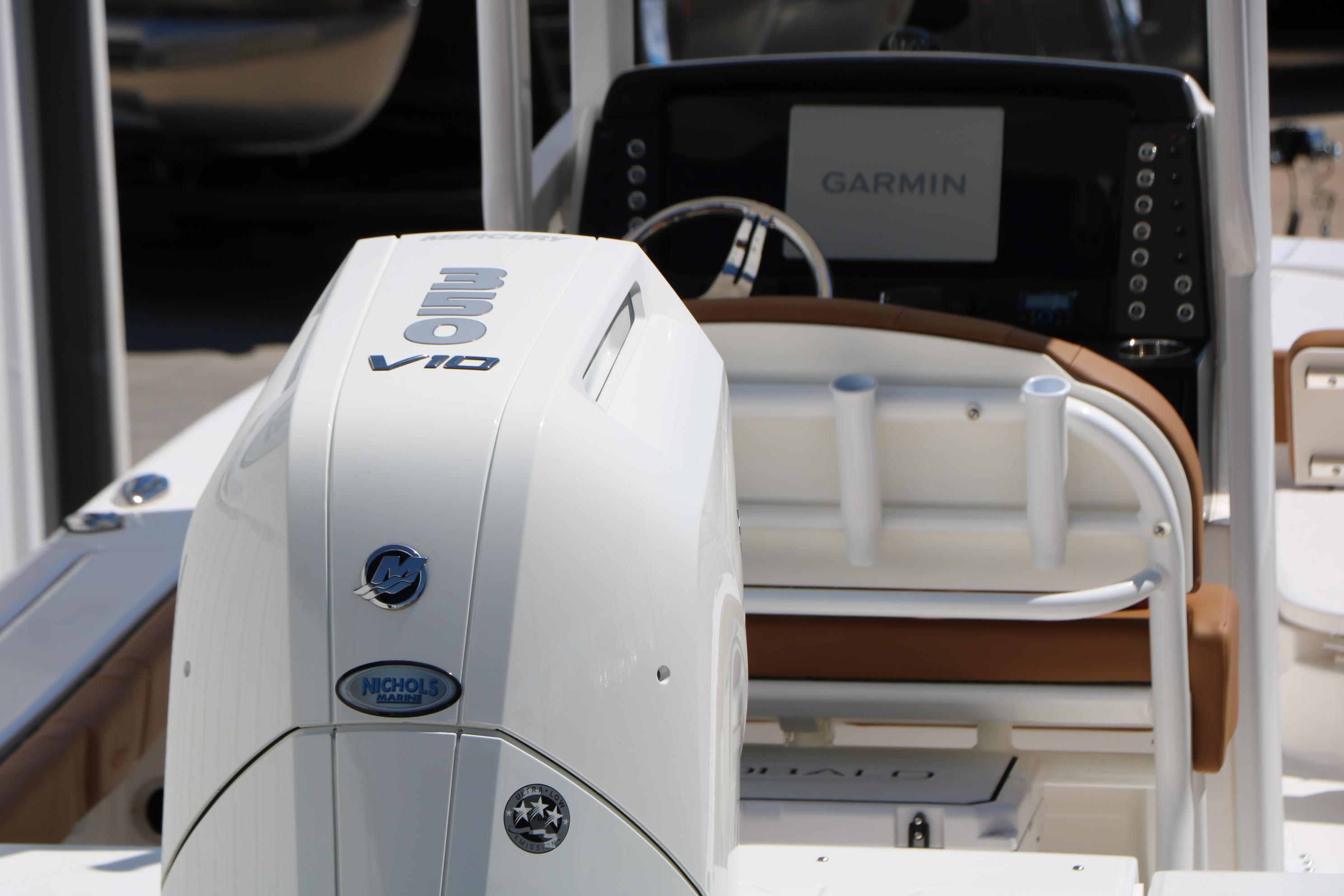 2026 Robalo 246 Cayman boat with 350 V10 engine and Garmin navigation system.