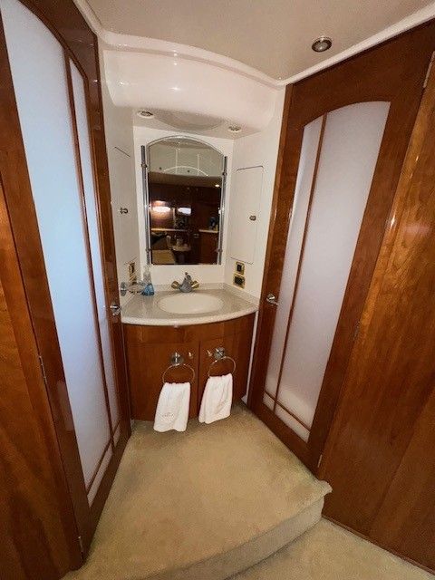 Luxurious bathroom in a 2002 Carver 570 Voyager Pilothouse yacht.