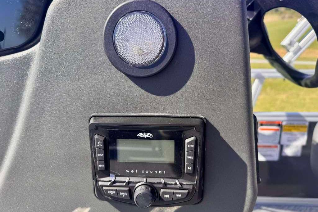 Control panel of 2026 Sun Tracker Bass Buggy 16 XL Select with audio system.