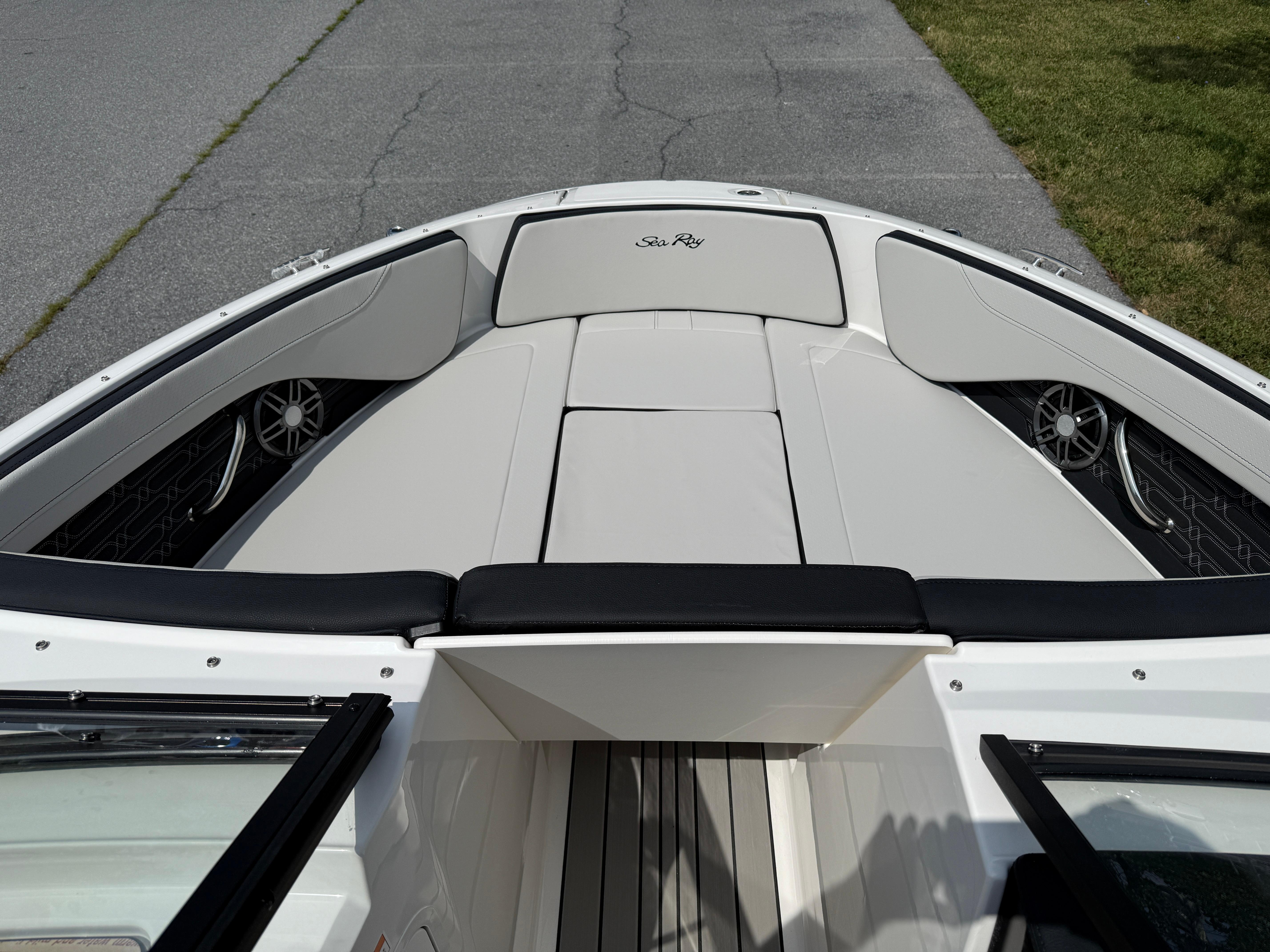 2026 Sea Ray SPX 210 Outboard boat interior with sleek seating and modern design.
