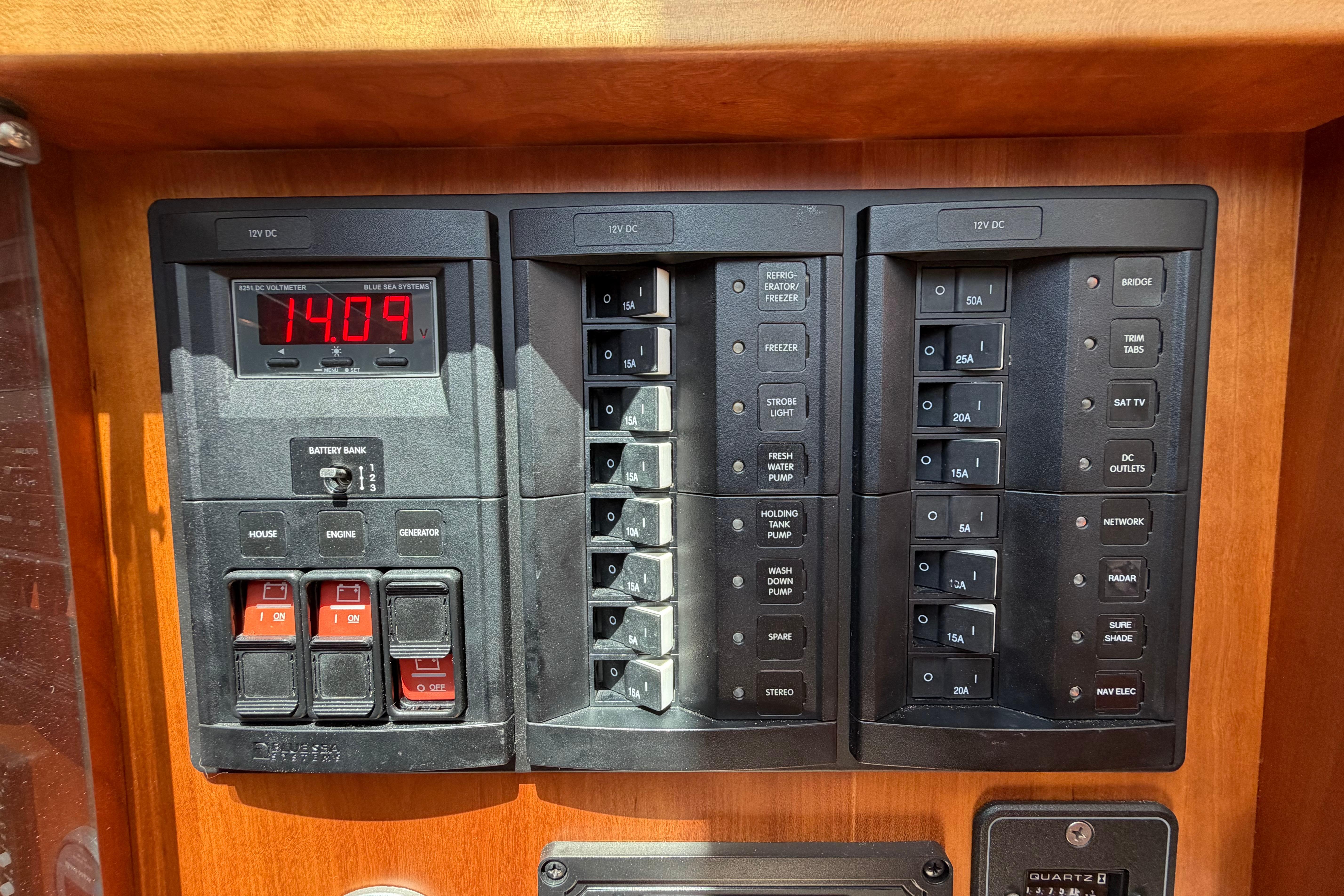 Electrical panel of 2015 Sabre 38 Salon Express yacht, showing voltage and switches.