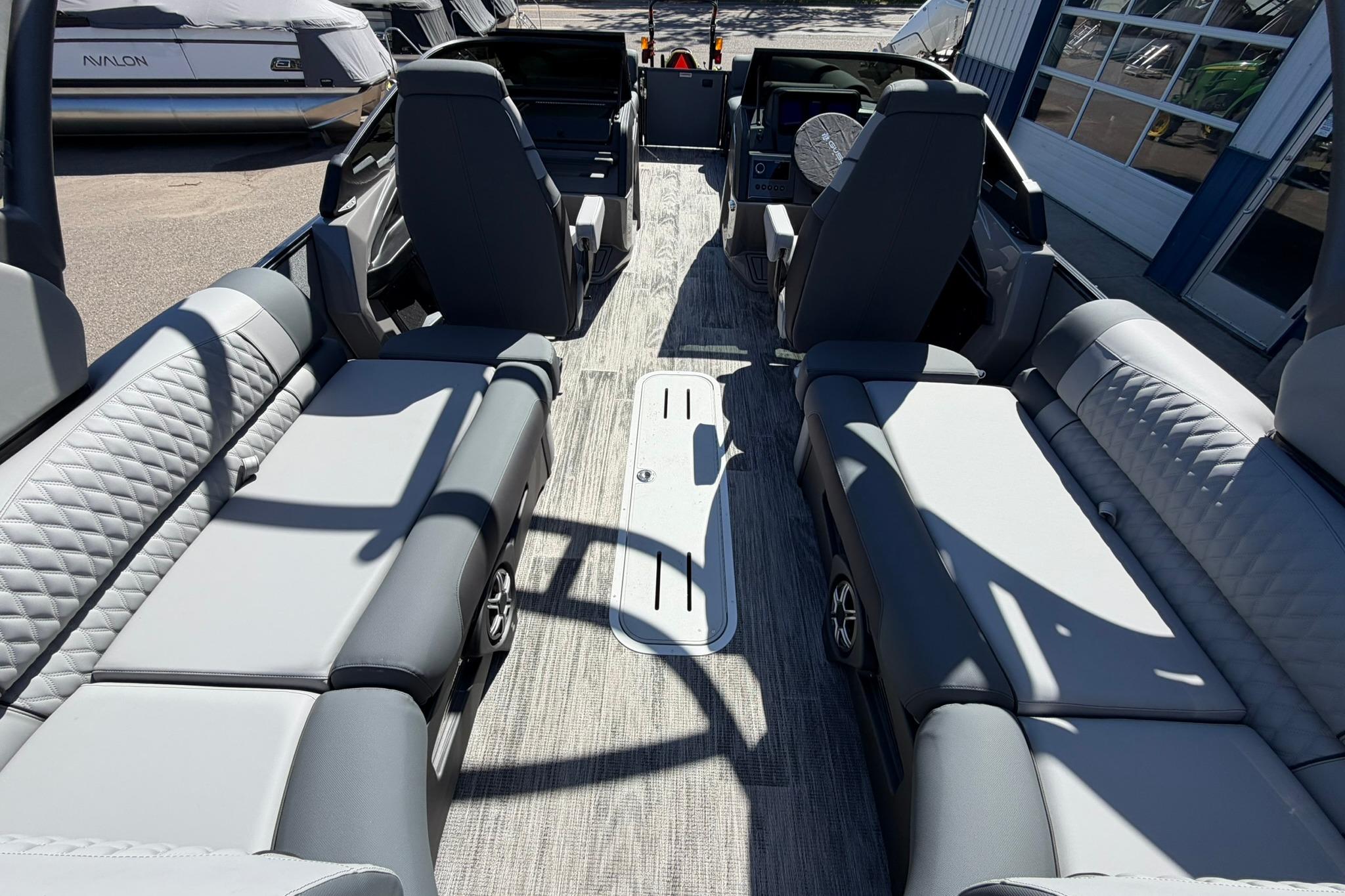 2026 Avalon Excalibur LTD Quad Lounge boat interior with luxurious seating and modern design.
