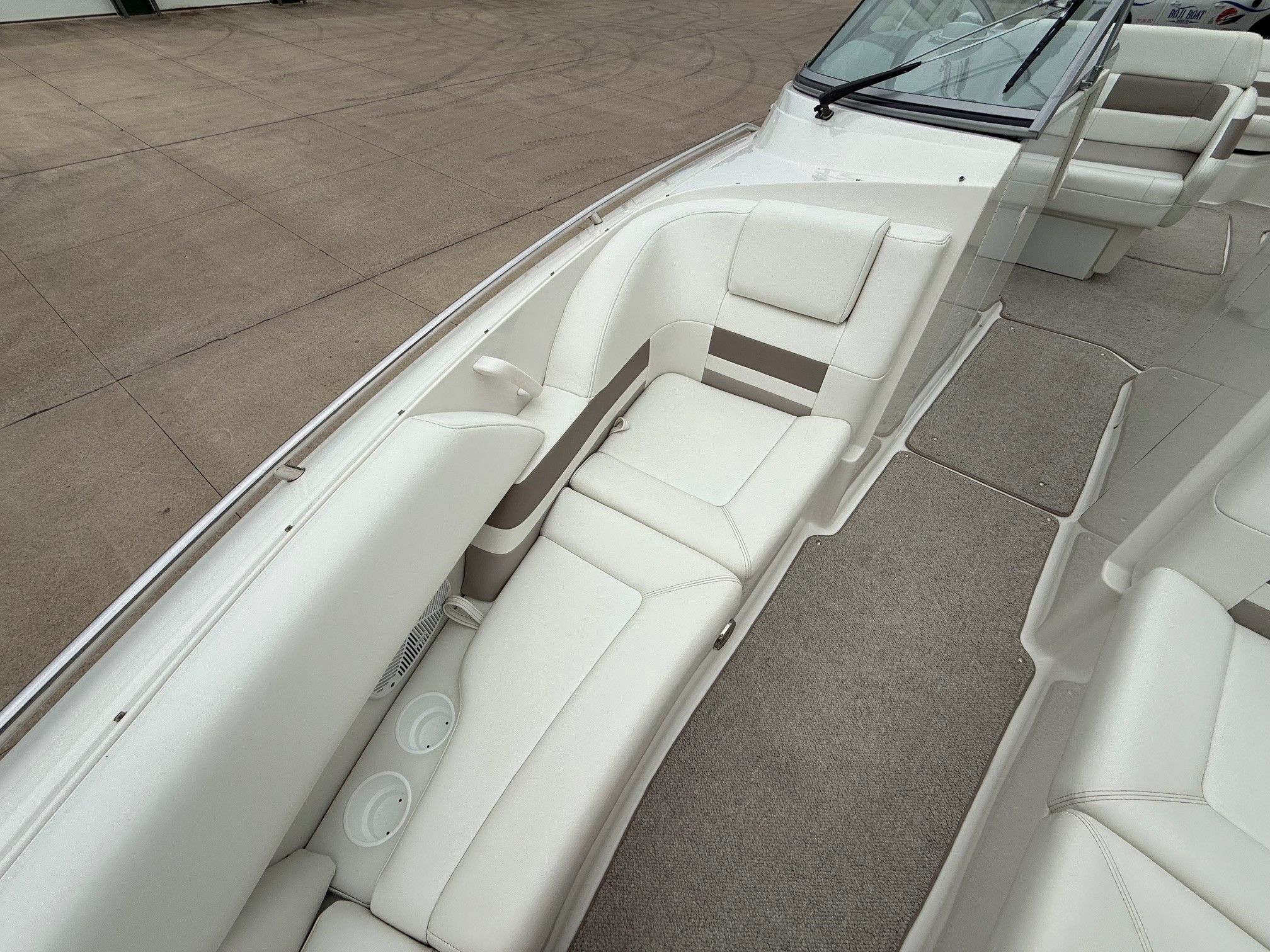 Interior of a 1998 Formula Thunderbird boat with white seating.
