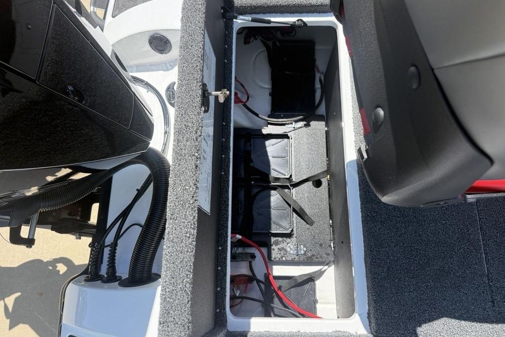 Battery compartment of 2026 Nitro Z20 XL Pro boat, showcasing wiring and setup.
