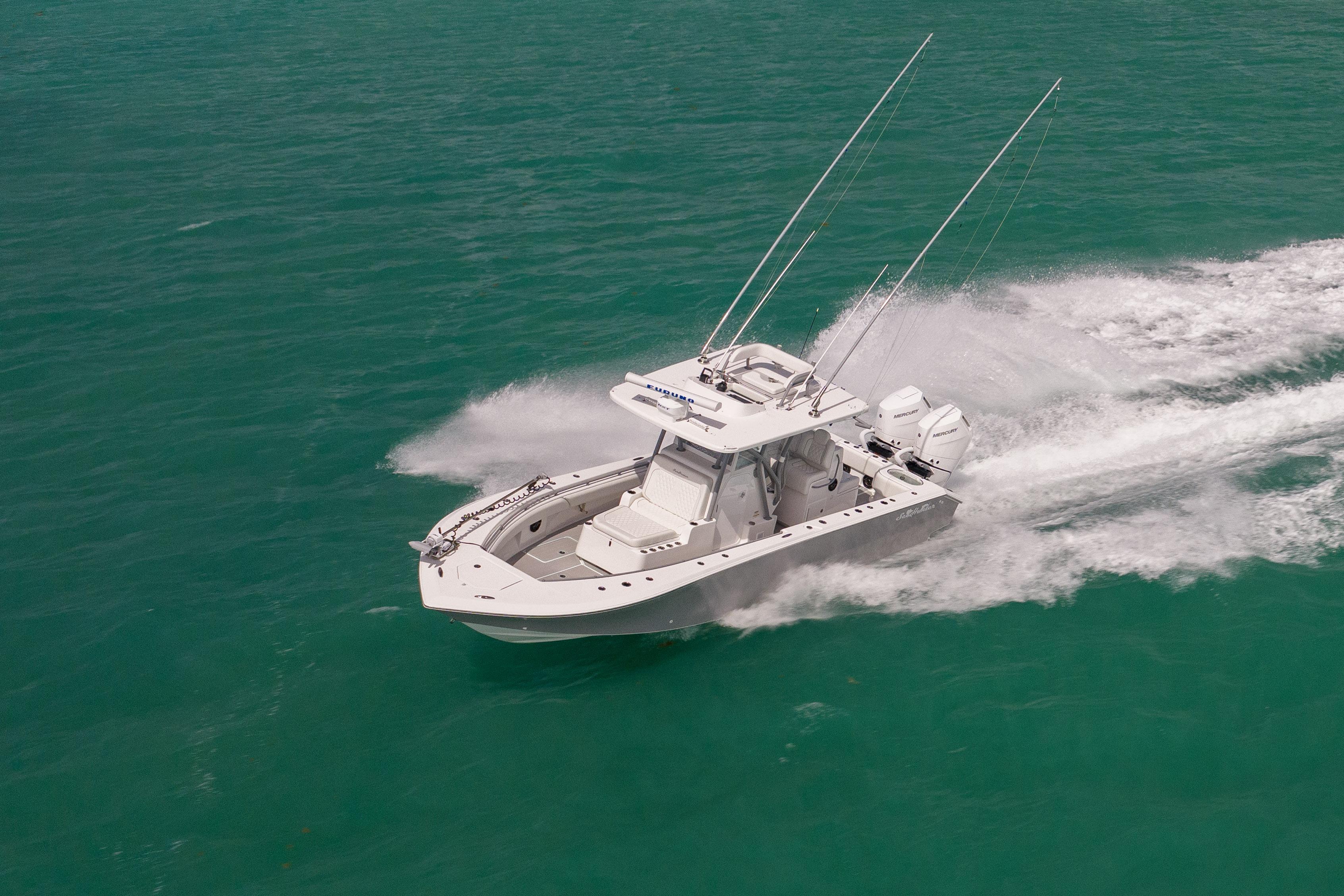 2025 SeaHunter 30 Floridian boat cruising on turquoise waters.