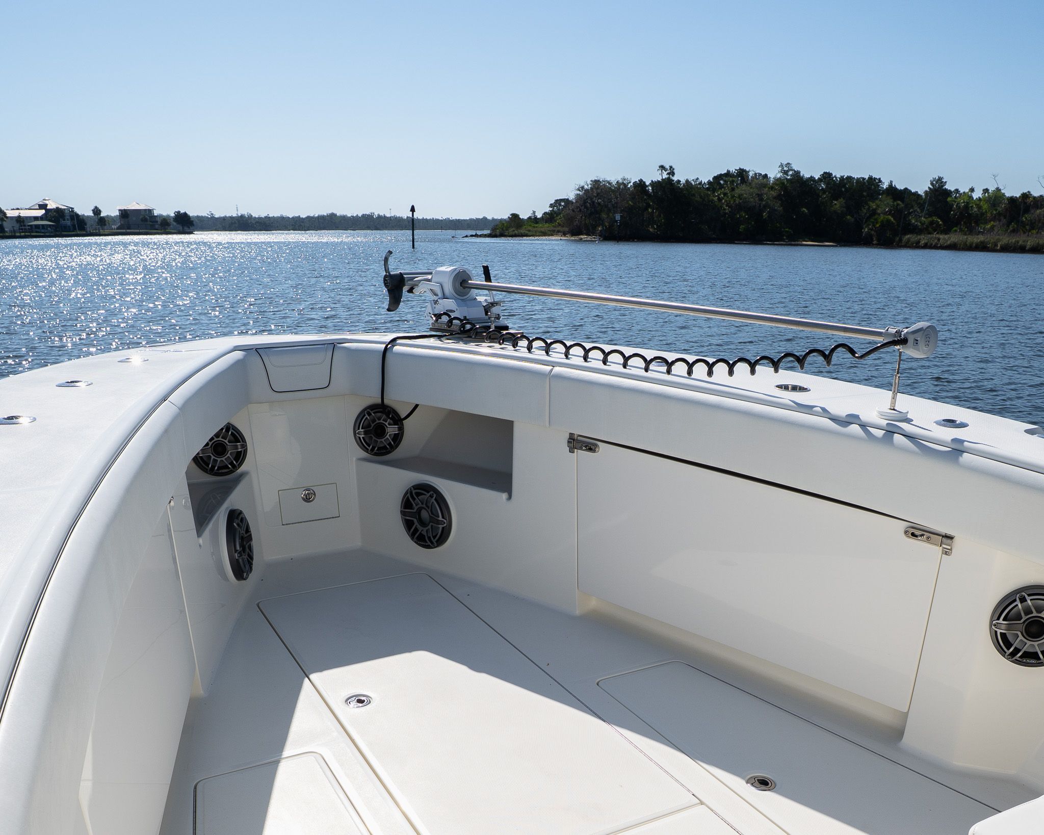 The image shows the bow of a 2022 SeaVee 370Z boat on calm water.