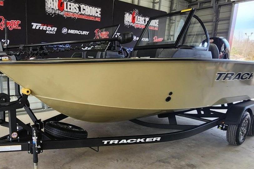 2026 Tracker Targa 185 WT boat on trailer in showroom setting.