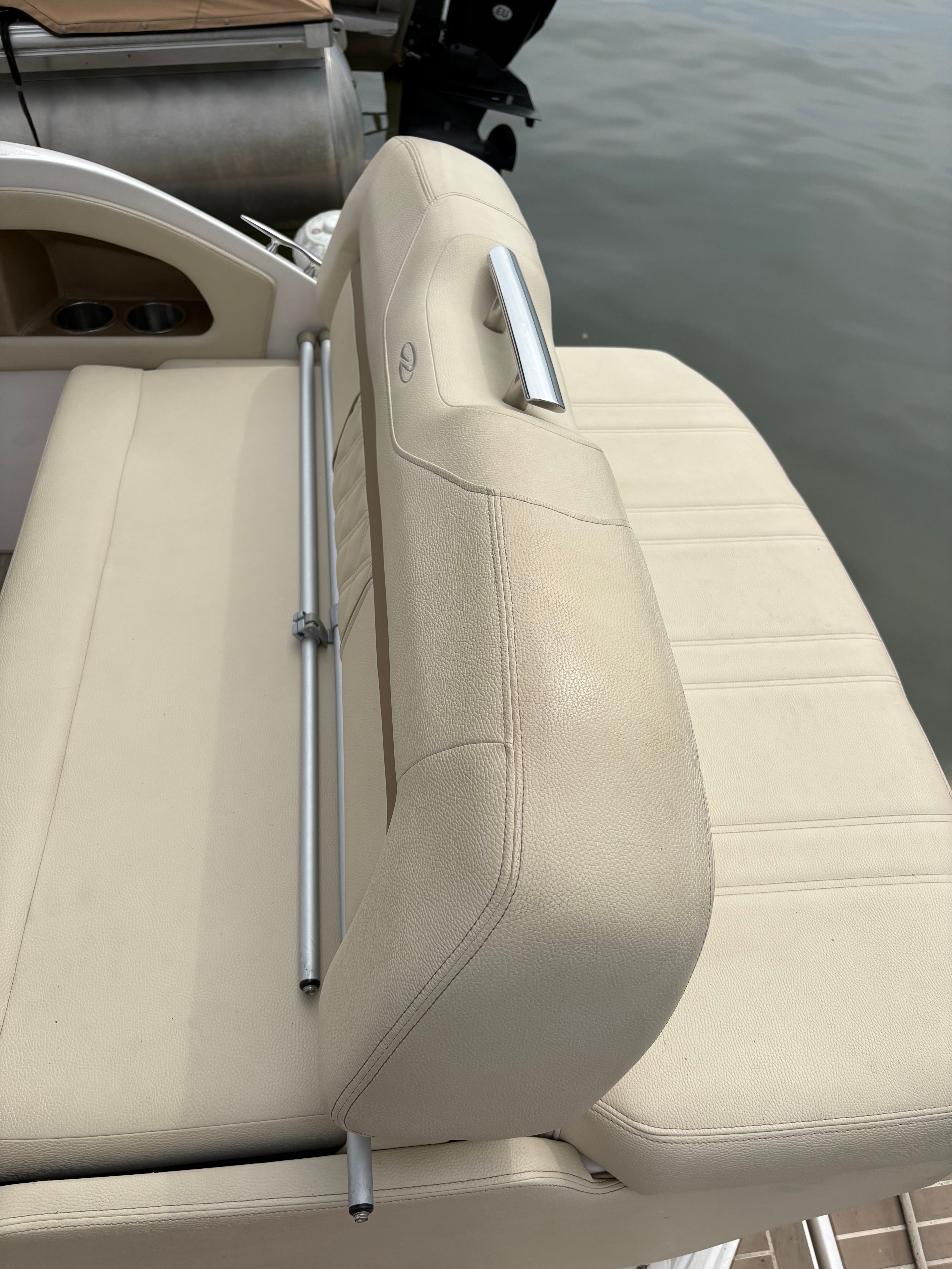 Regal 28 Express 2019 boat seat in beige leather.