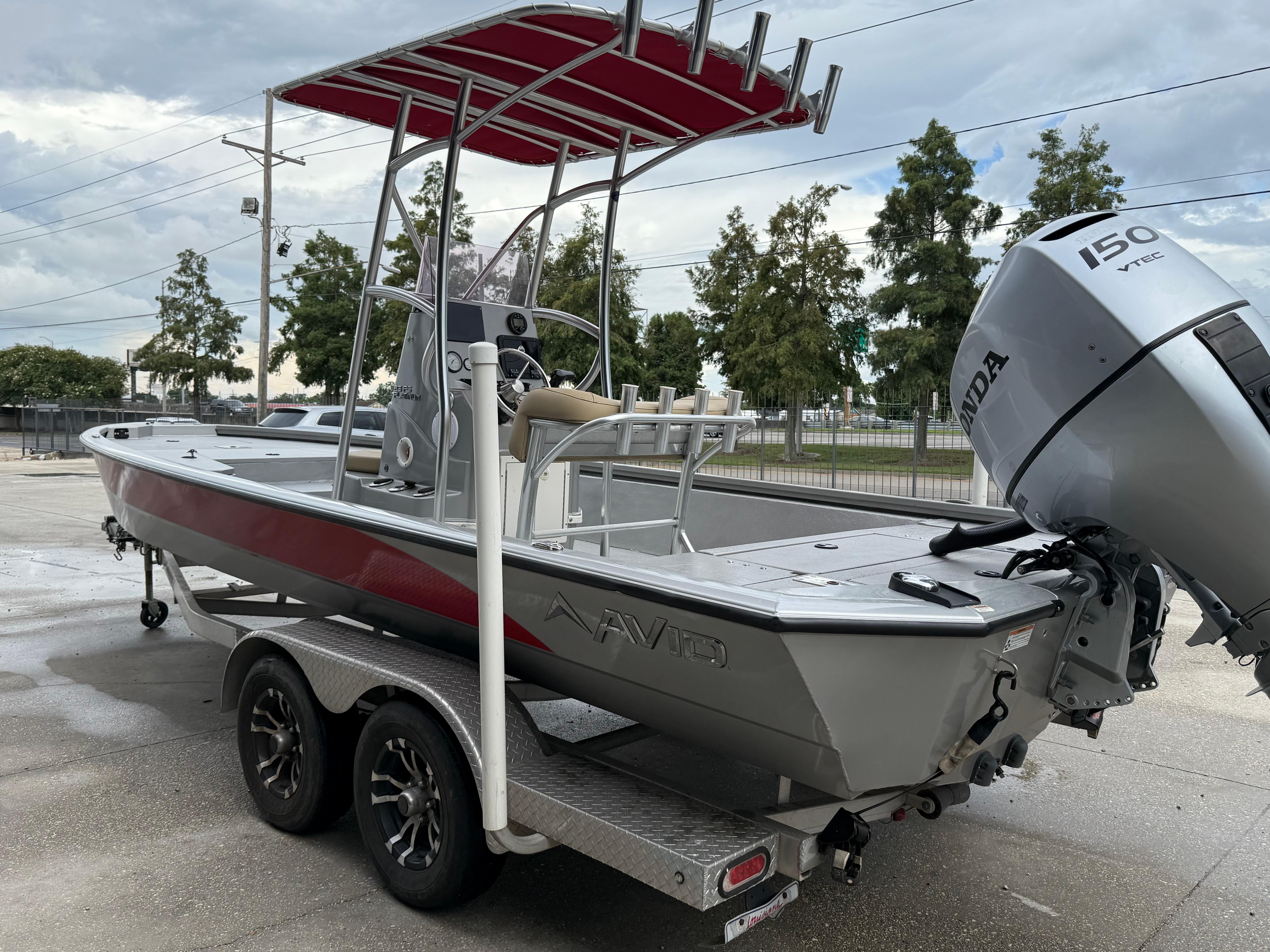 2020 Avid 23 FS Platinum boat with Honda 150 VTEC engine on trailer.