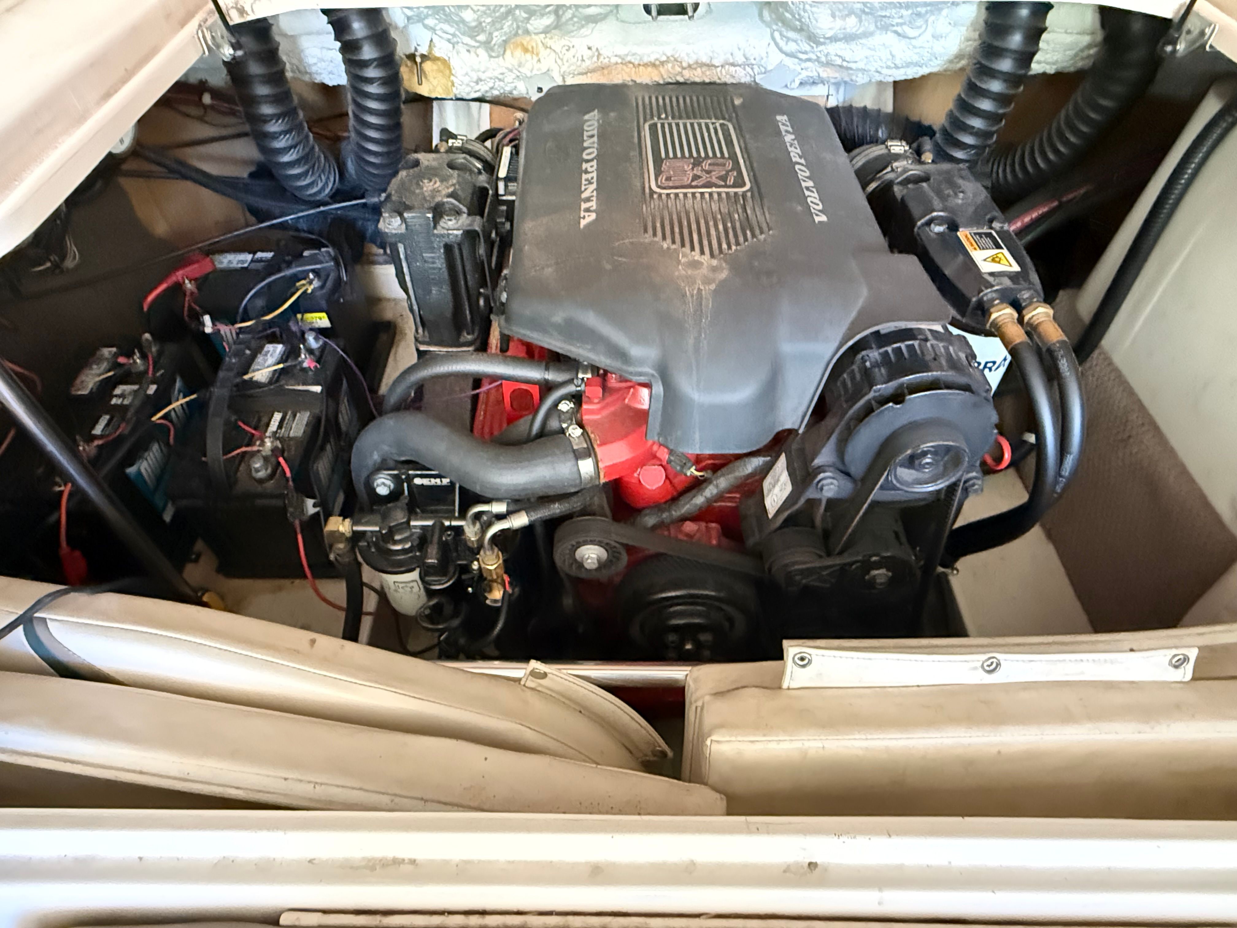 Engine compartment of a 2002 Glastron GX 205 Ski & Fish boat.