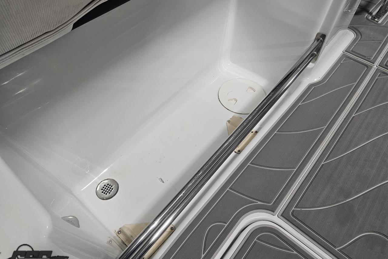 2008 Baja 335 Performance boat interior with sleek flooring and drainage system.