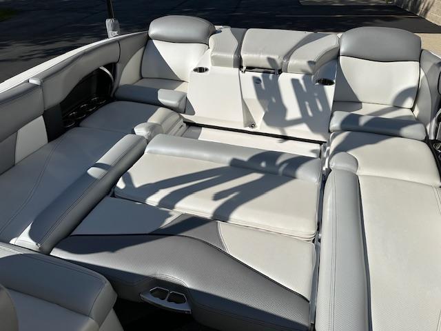 2016 MasterCraft X46 boat interior with gray and white seating.