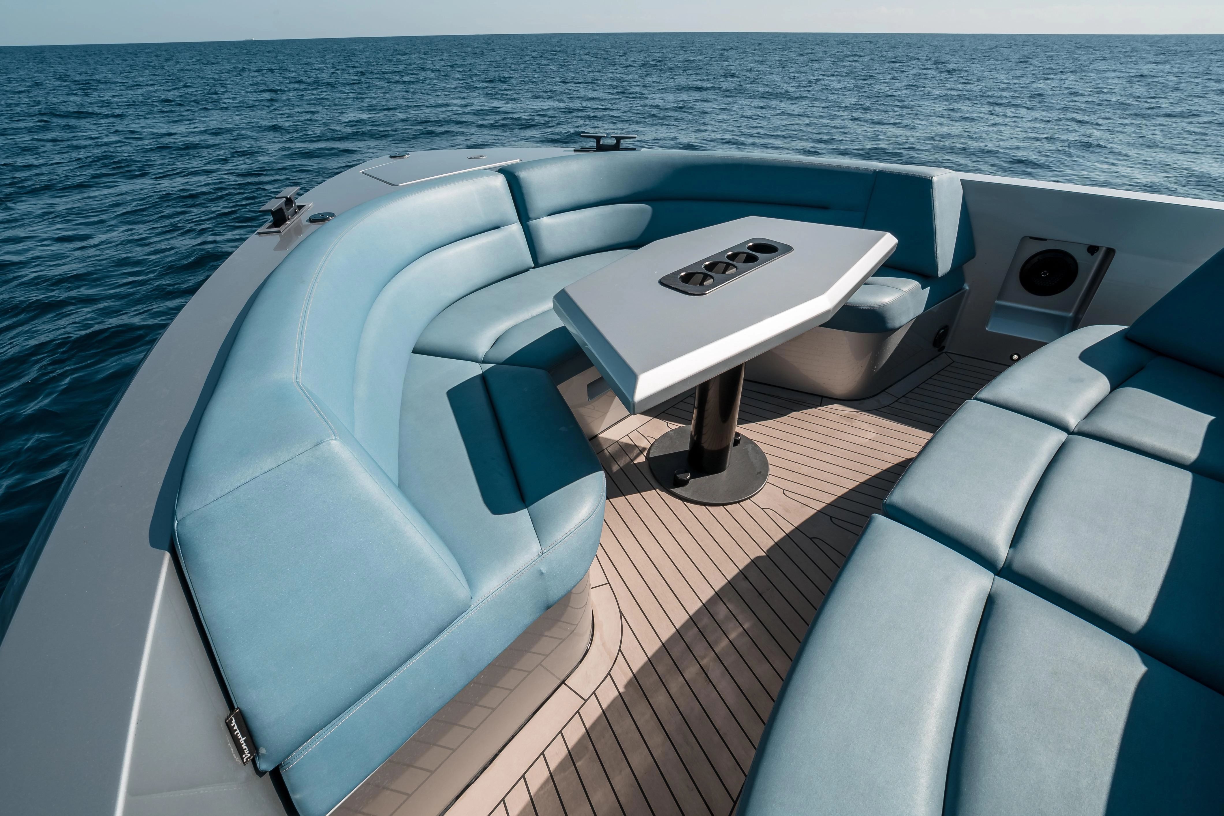 Luxurious seating area on Vanquish VQ45 Veloce yacht, 2023 model.