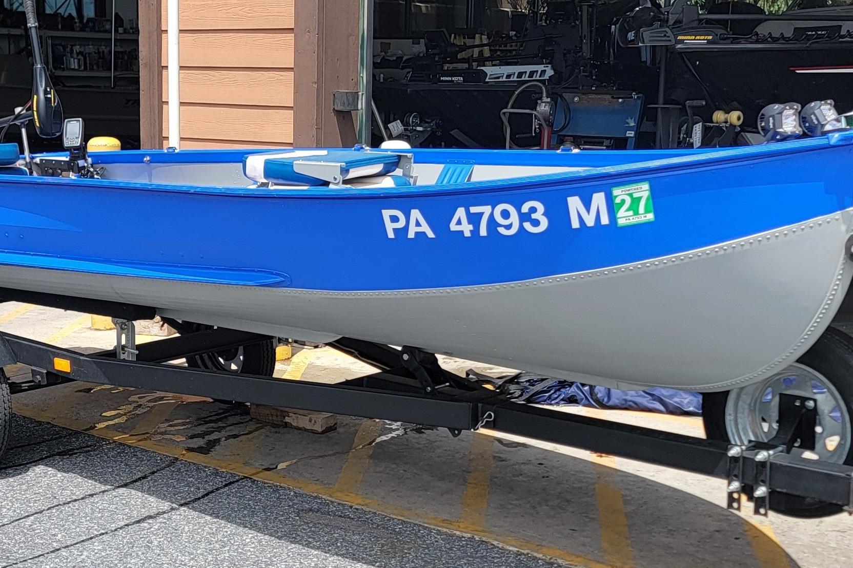 1966 Sea Nymph V-14 boat in blue and gray on a trailer, registration PA 4793 M.