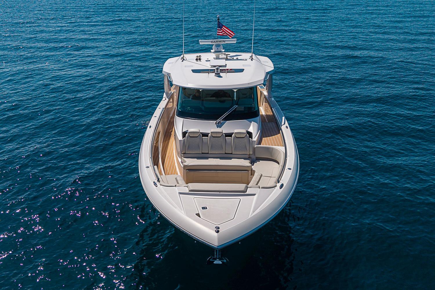 2024 Tiara Yachts 48 LS luxury boat on open water, front view.
