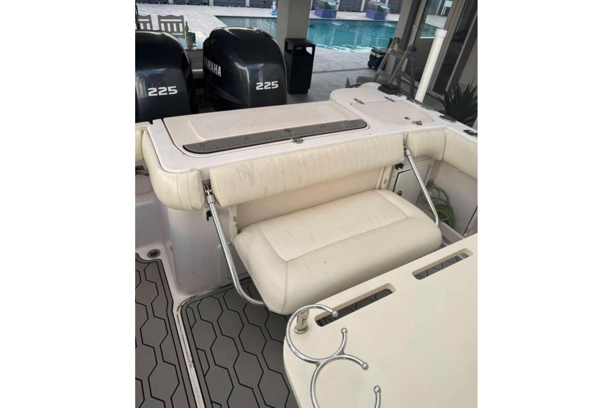 2004 Grady-White Chase 273 boat interior with Yamaha 225 engines.
