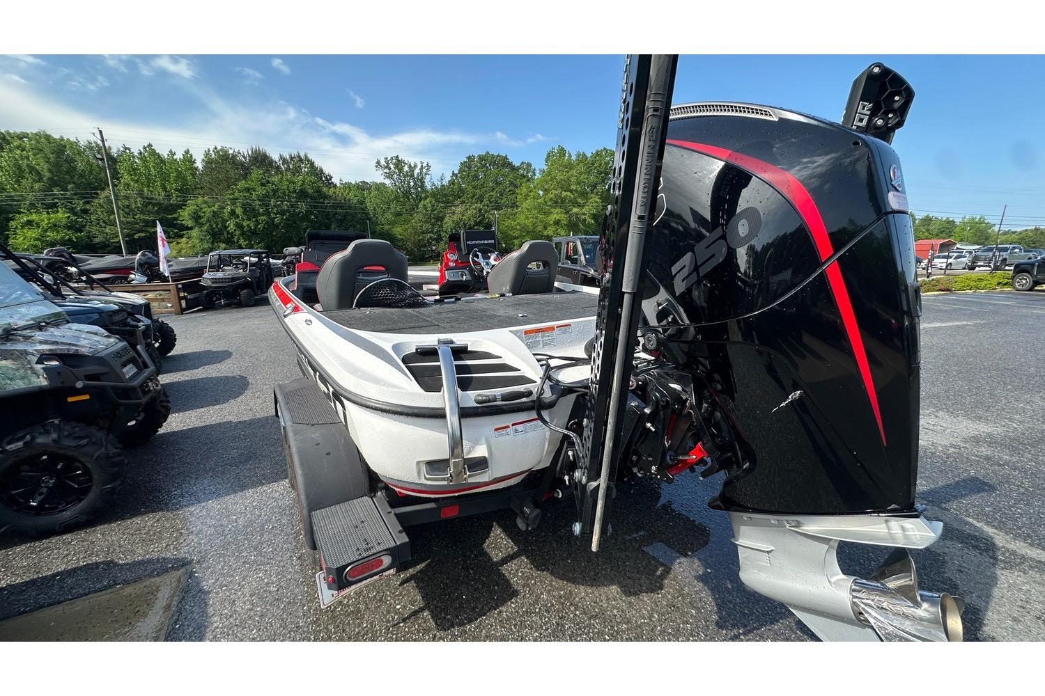 2023 Nitro Z20 Pro boat with powerful engine, parked outdoors on a sunny day.