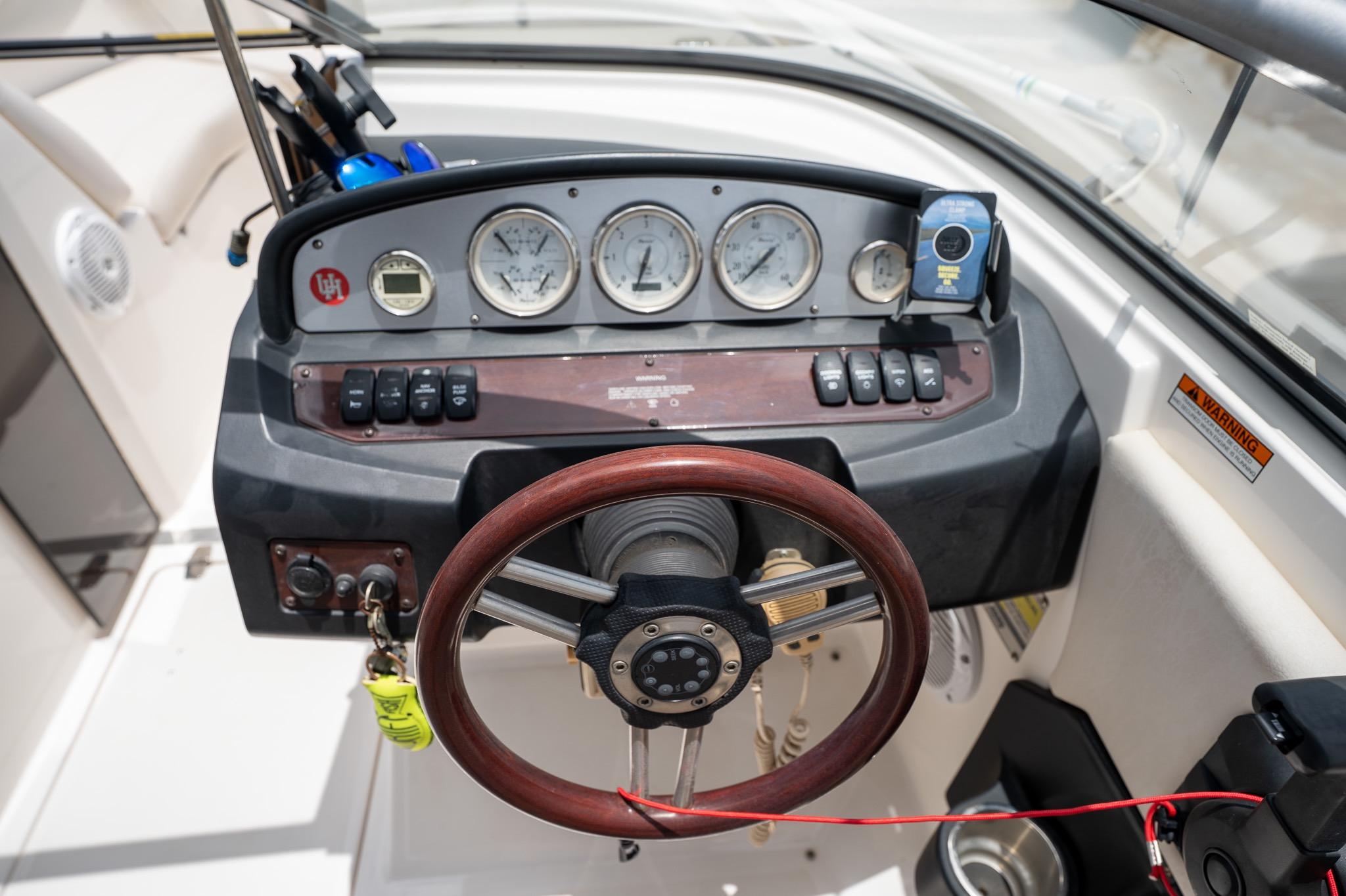 2008 Regal 2000 Bowrider dashboard with gauges and steering wheel.