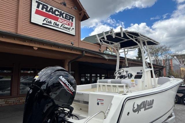 2026 Mako 214 Center Console boat displayed outside Tracker Boats dealership.