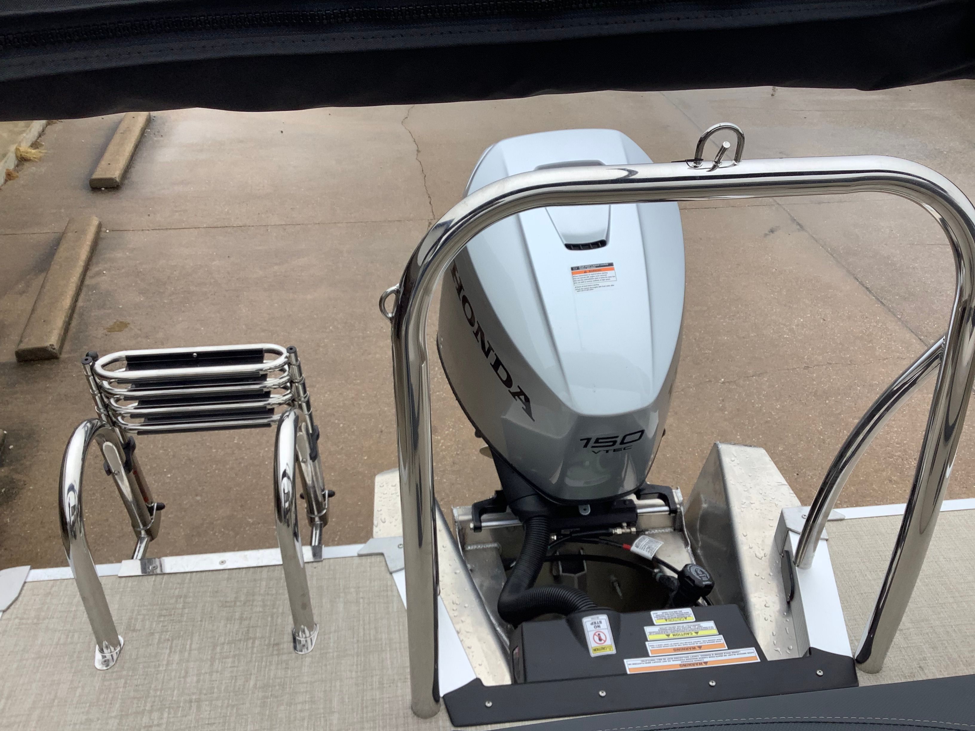 2026 Tahoe 2185 LTZ with Honda 150 engine and ladder.