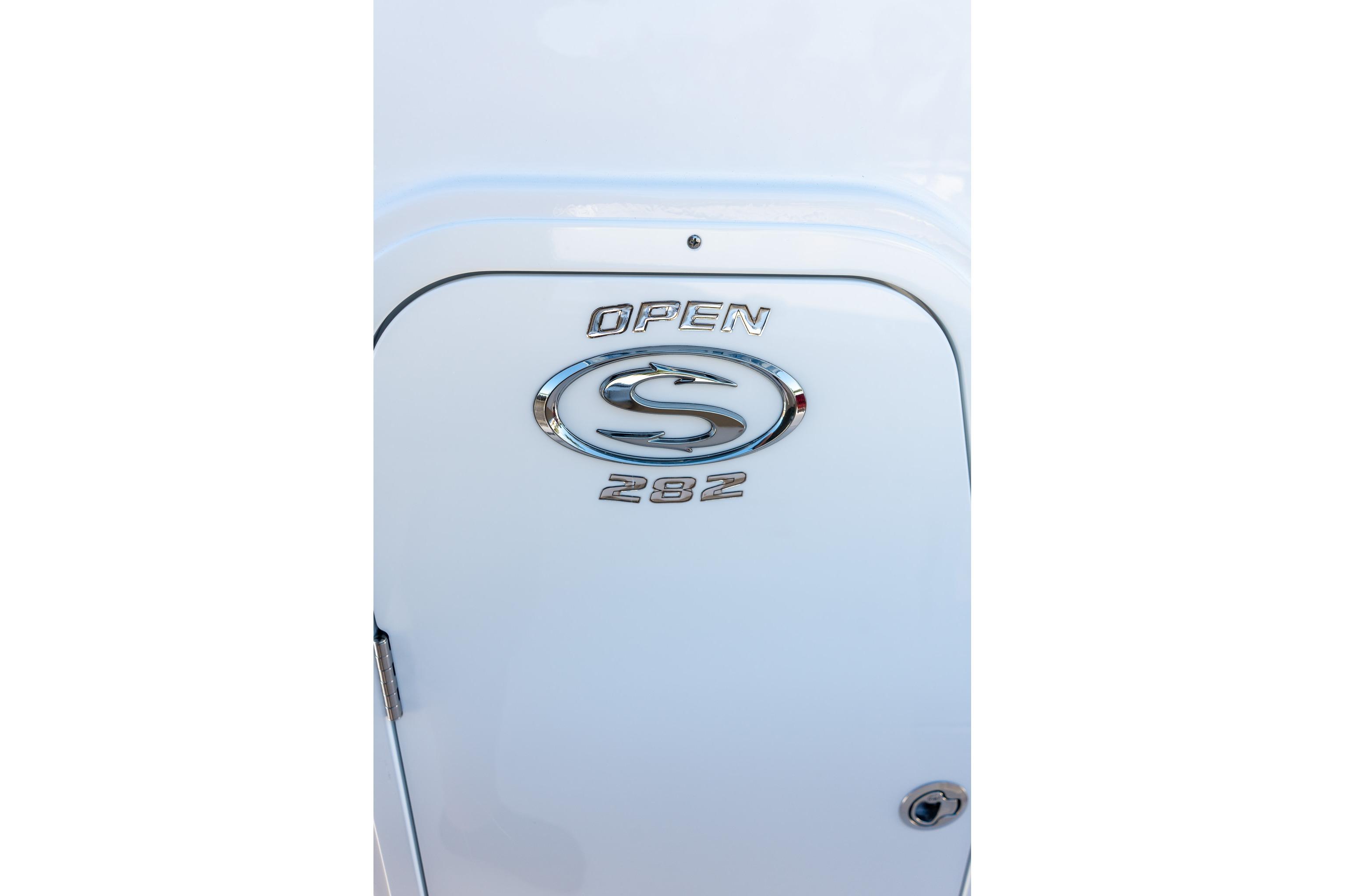2026 Sportsman Open 282 Center Console logo on white surface.