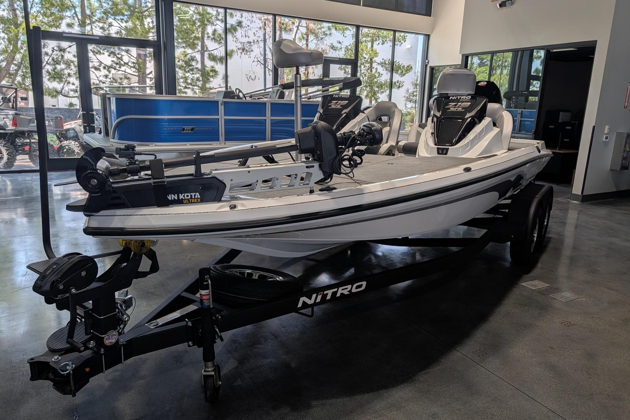 2026 Nitro Z19 XL Pro boat displayed indoors on a trailer.