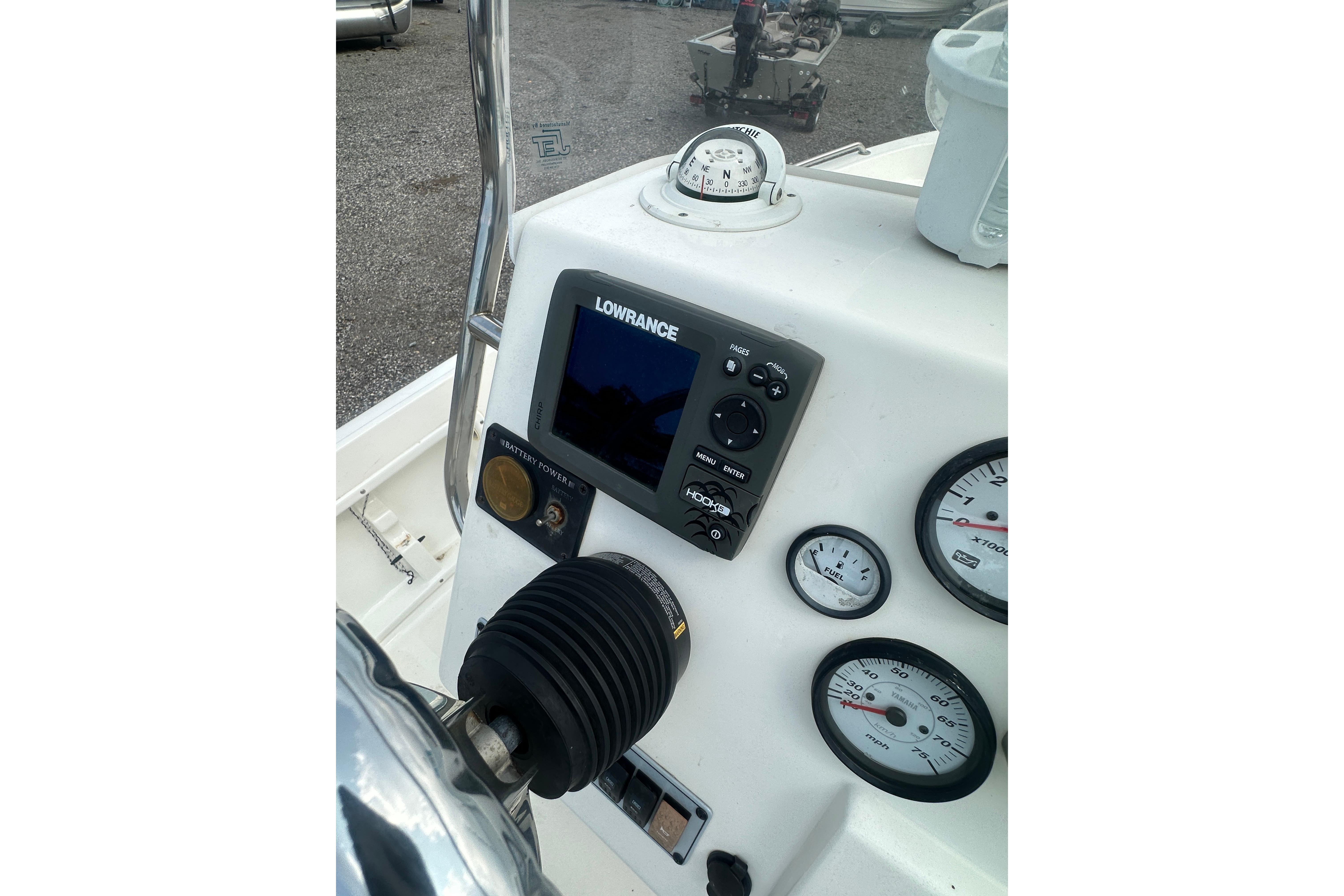 2018 Key West 1720 Center Console dashboard with Lowrance display and gauges.