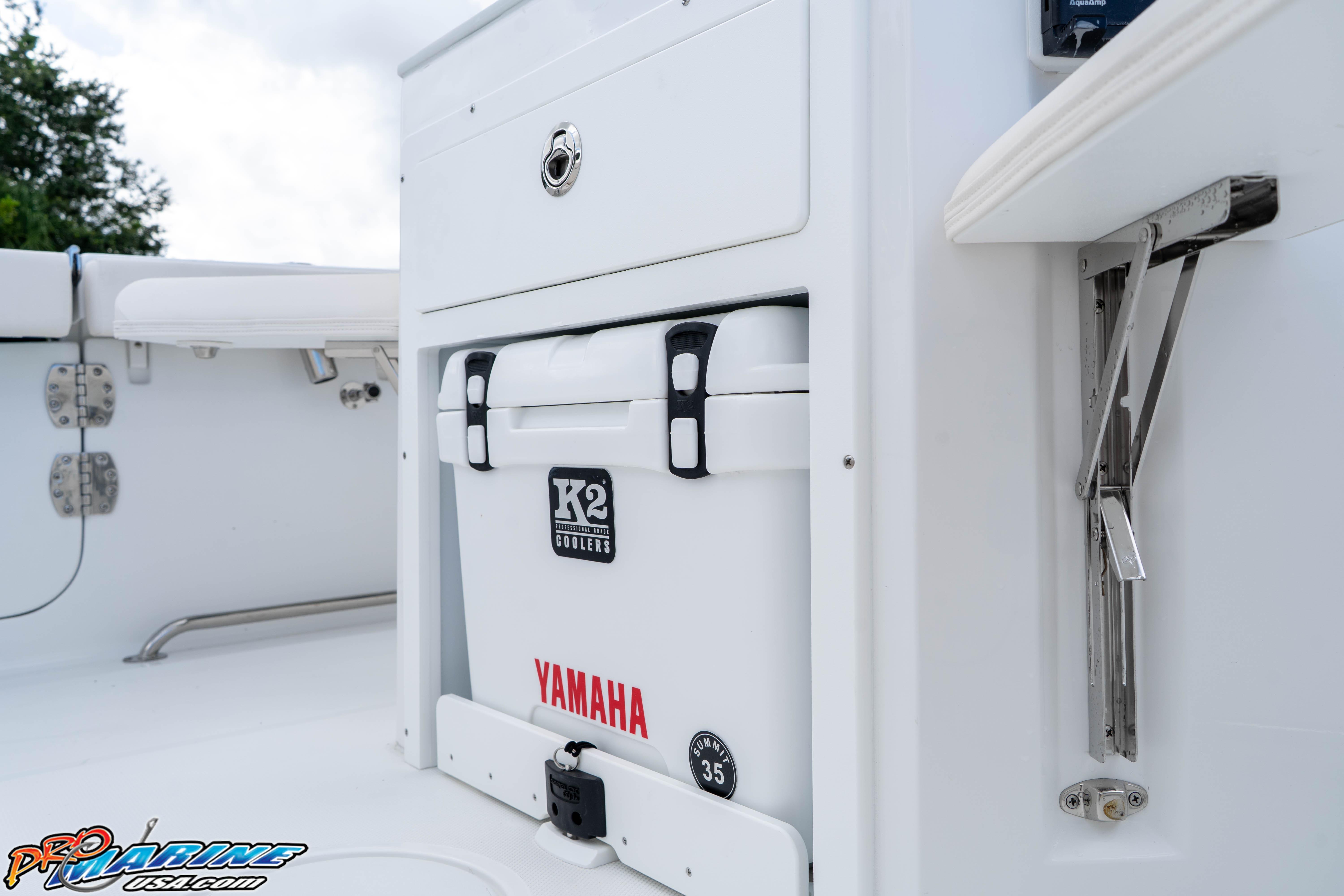 2026 Sea Hunt Ultra 265 SE boat interior with K2 cooler and Yamaha branding.