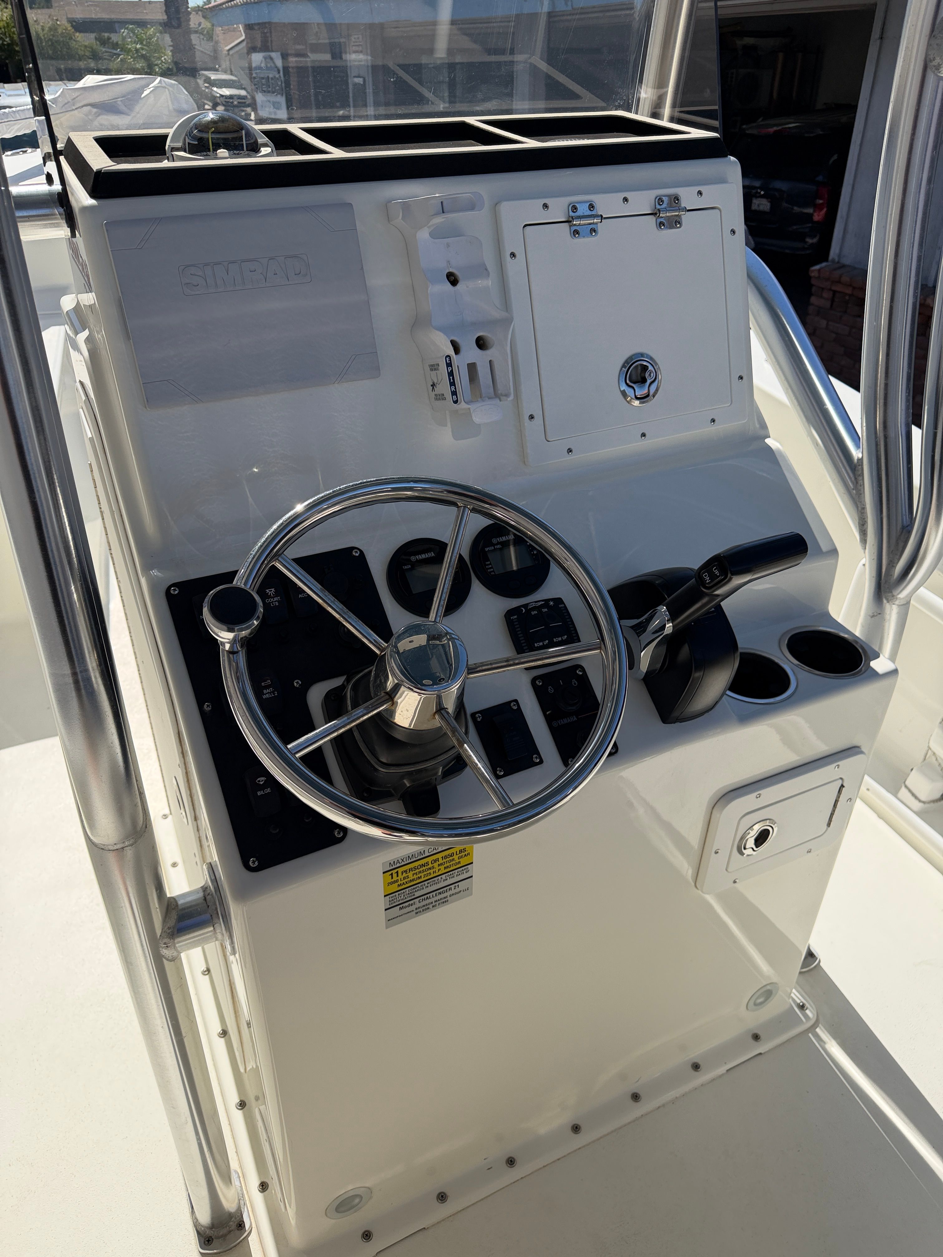 Steering console of a 2021 KenCraft Challenger boat.