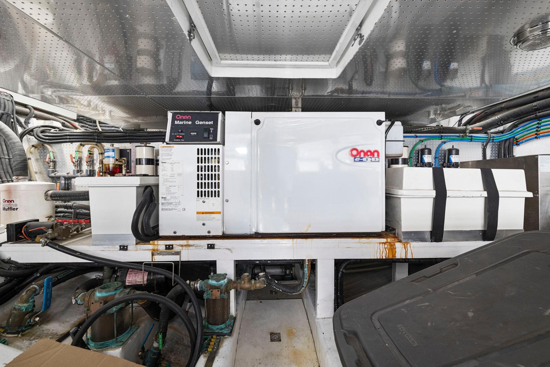 Engine room of a 2008 Dyna 51 yacht with Onan generator and equipment.