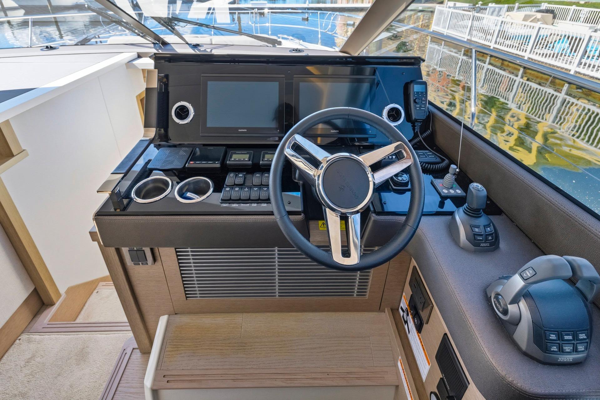 Cockpit of 2022 Prestige 520 yacht with modern steering and navigation controls.