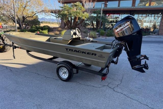 2026 Tracker Grizzly 1648 SC boat with Mercury outboard motor on trailer.