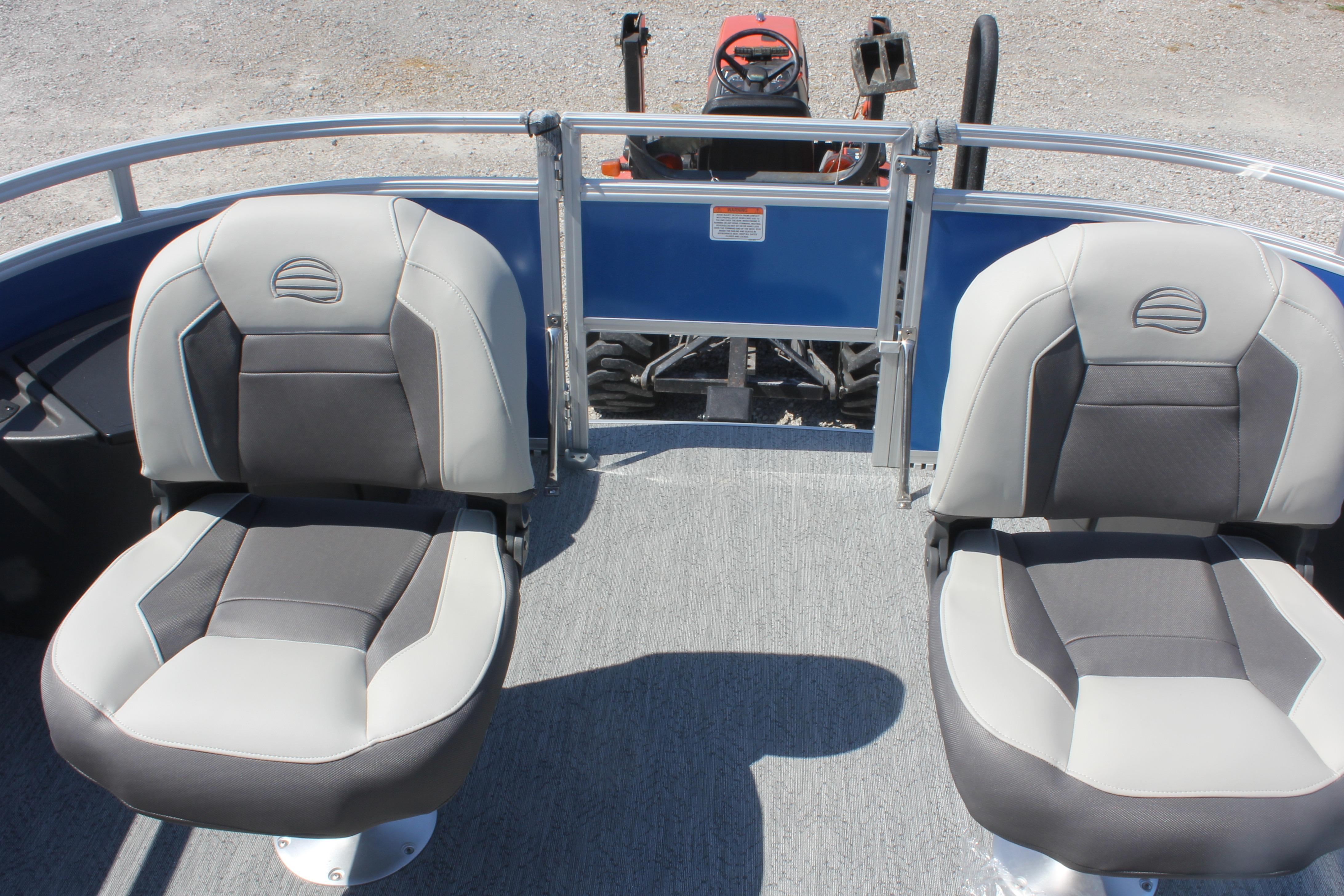 2026 Sun Tracker Fishin' Barge 20 DLX with two cushioned seats on deck.