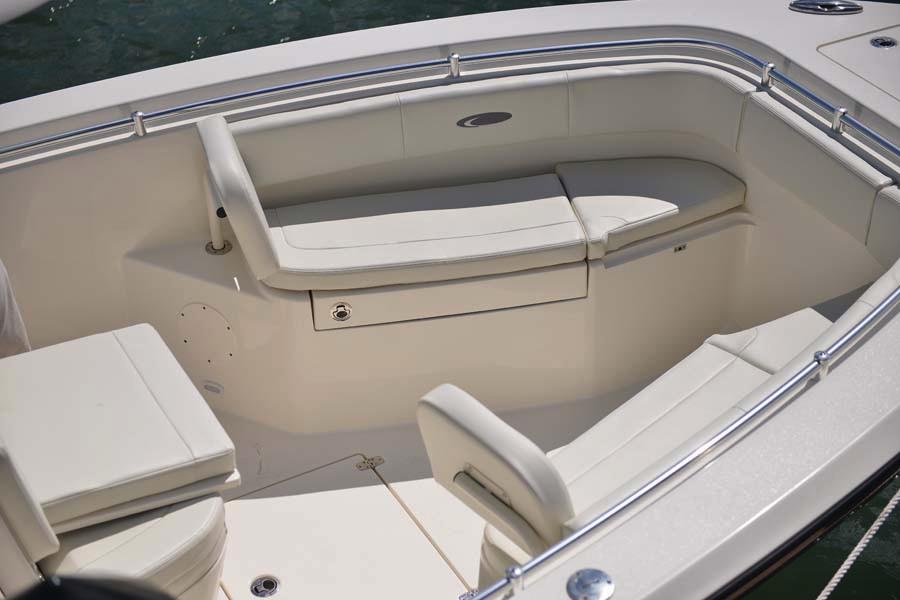 Manufacturer Provided Image: 2022 Cobia 262 Center Console boat with spacious seating area.