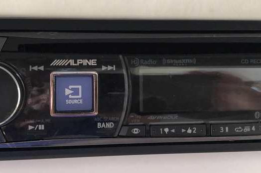 Alpine stereo system in a 1999 Regal Commodore 2760 boat dashboard.