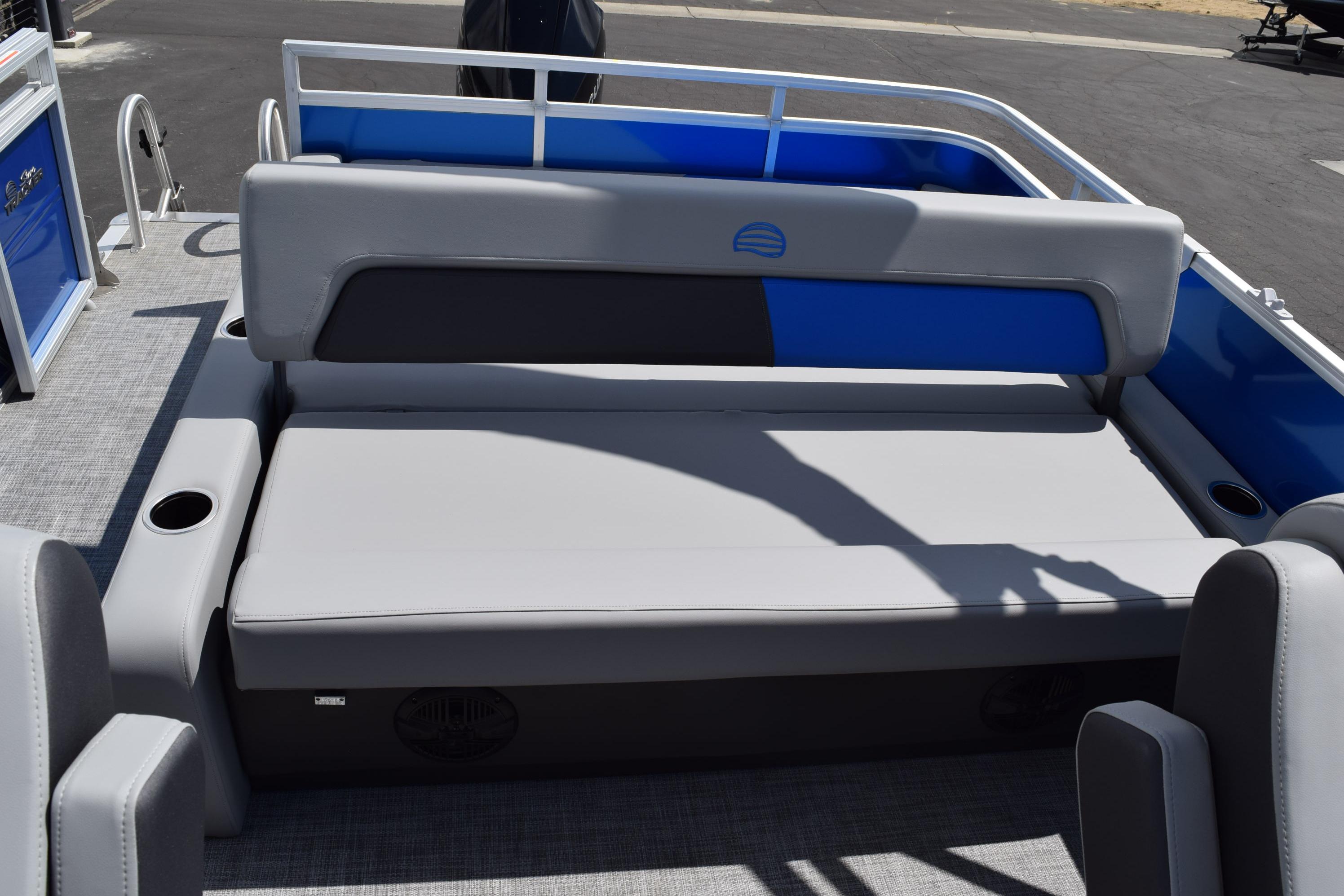 2026 Sun Tracker Party Barge 22 RF XP3 interior seating with gray upholstery and cup holders.