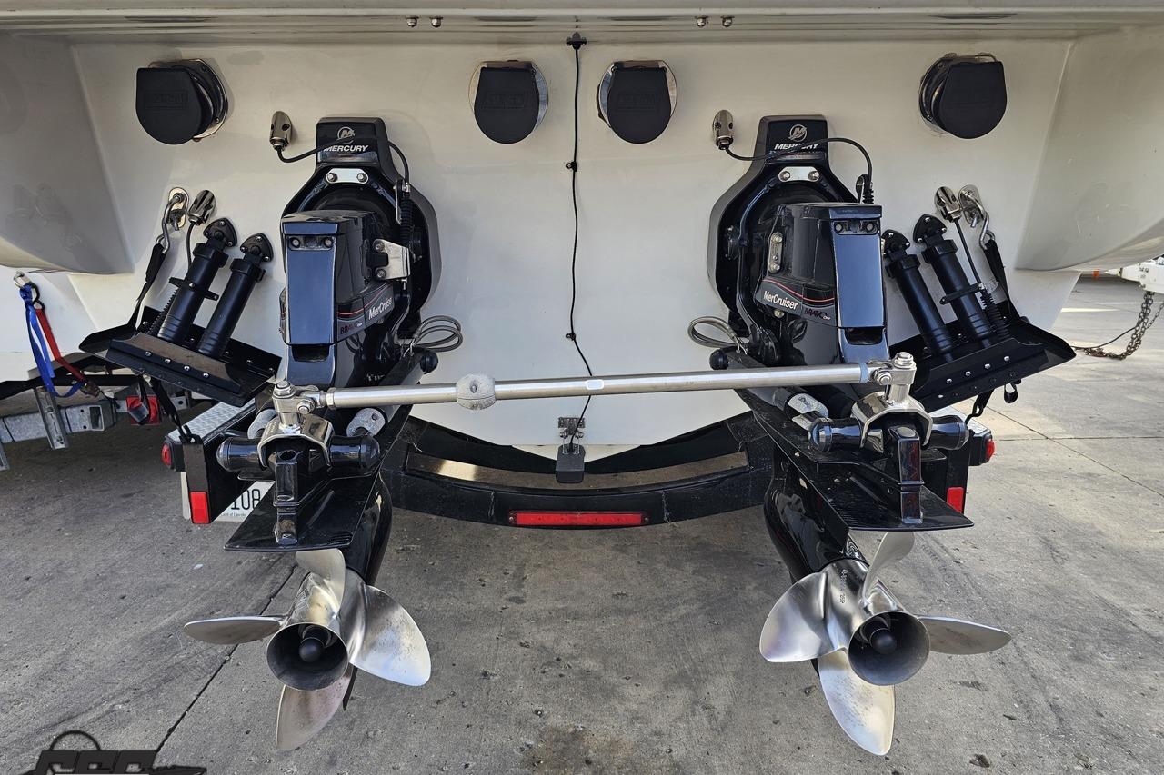 2014 Formula 292 FASTech boat with dual Mercury outboard engines and stainless steel propellers.