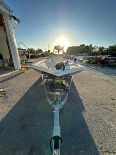 2024 Ranger RB190 boat on trailer at sunset near a storage facility.