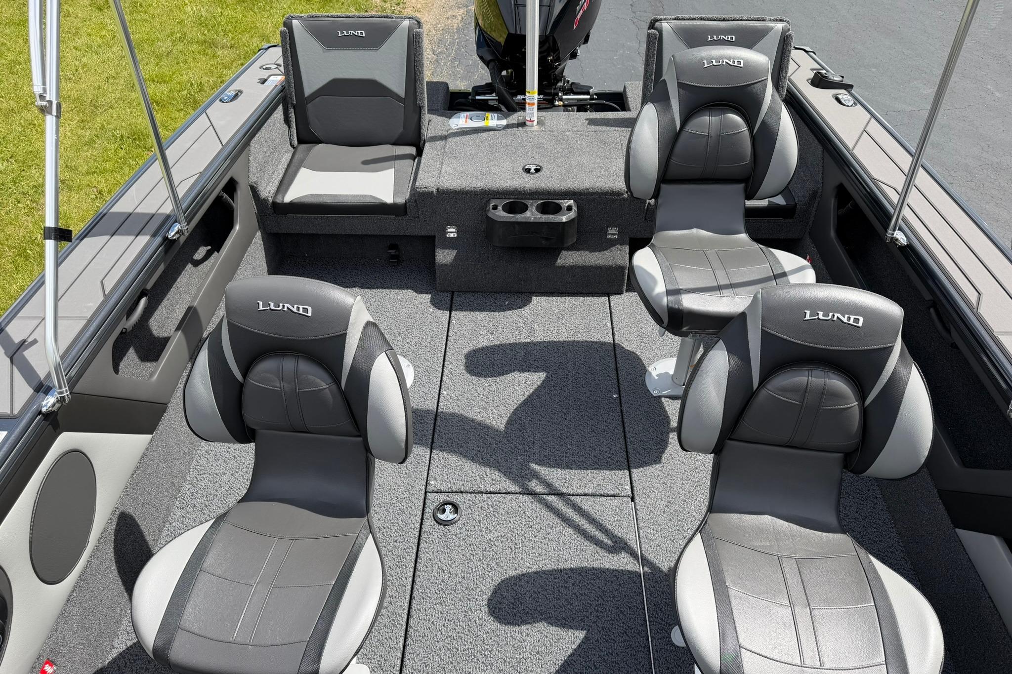2027 Lund 1875 Crossover XS boat interior with four cushioned seats and modern design.