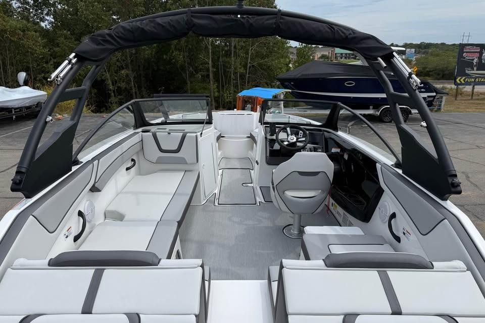 2026 Yamaha Boats AR220 interior with sleek seating and modern dashboard design.