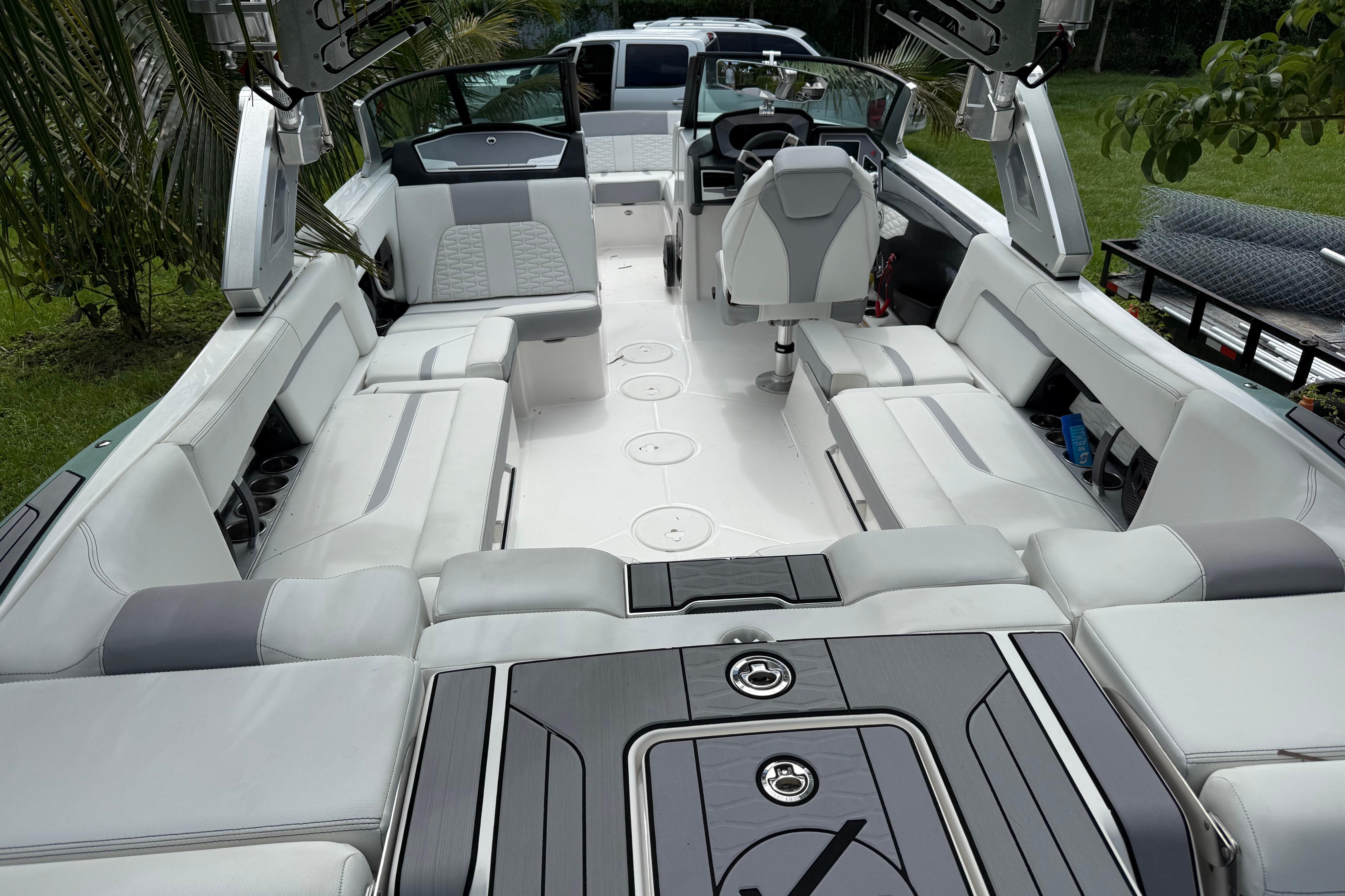 2023 MasterCraft X24 boat interior with luxurious seating and modern design.